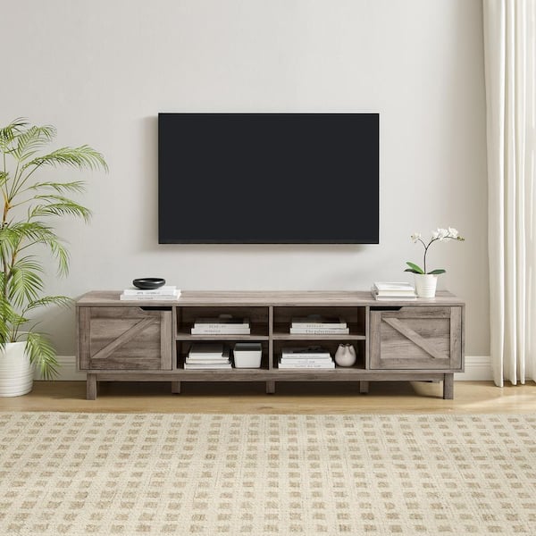 Welwick Designs 70 in. Grey Wash Wood Modern Farmhouse TV Stand with 2 Barndoors Fits TVs up to 80 in.