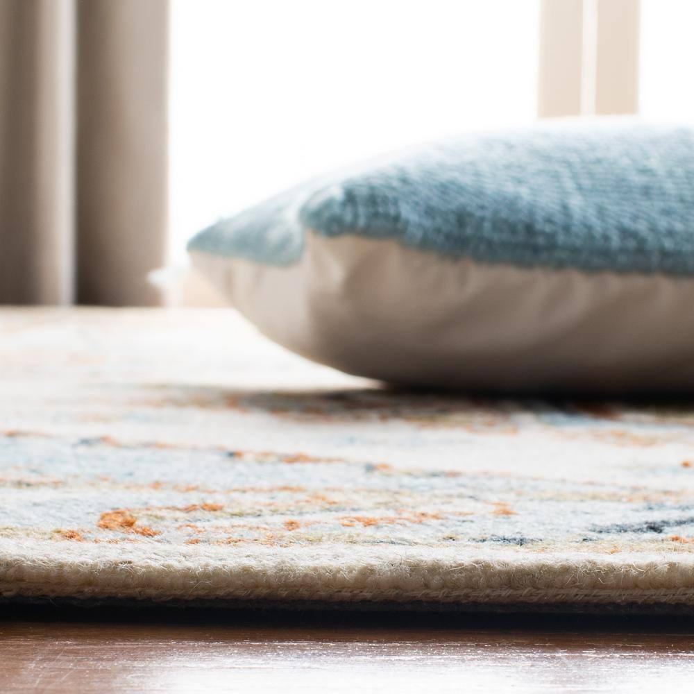 Ivory and Rust Medallion Wool 8' x 10' Handmade Tufted Rug