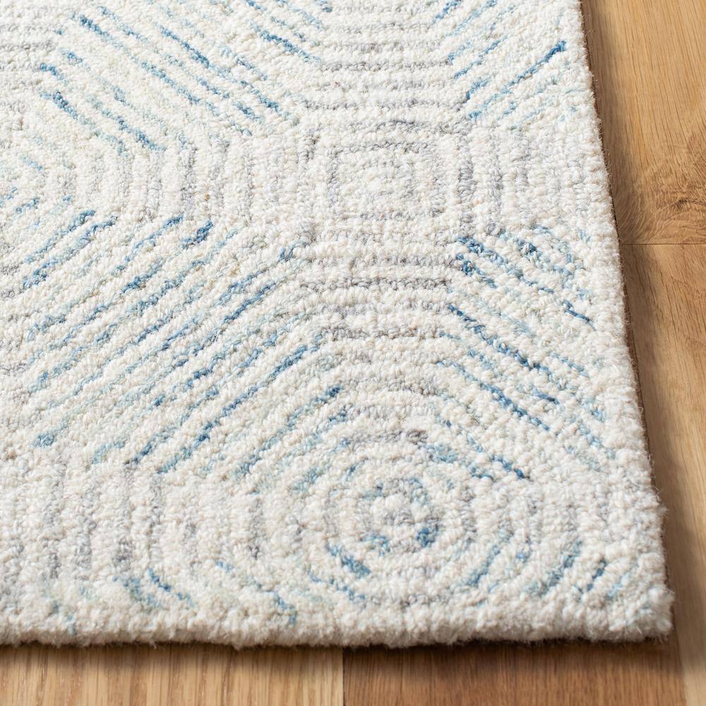 Handmade Light Blue Abstract Wool and Synthetic 4' x 6' Rug