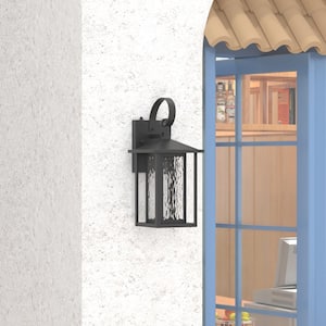 Montpelier 14.35 in. Sand Grain Black Dusk to Dawn Integrated LED Outdoor Hardwired Lantern Sconce with Water Glass