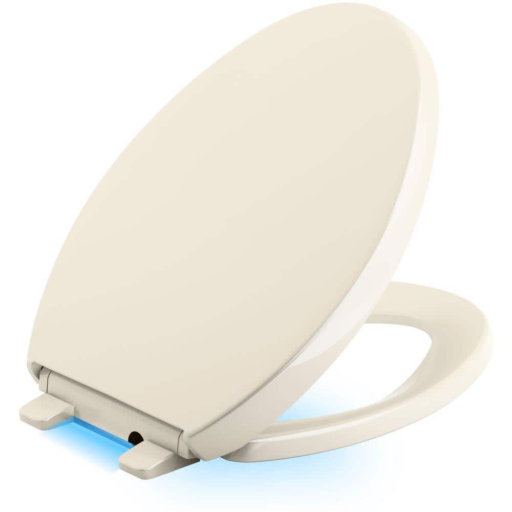 KOHLER Reveal LED Nightlight Elongated Closed Front Toilet Seat in AlmondK7579247 The Home