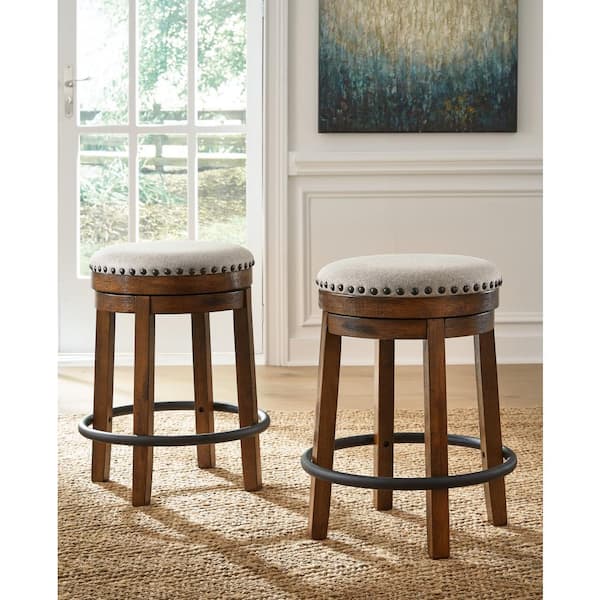 Signature DESIGN BY ASHLEY Valebeck 24 In. Brown/Black Backless Wood Counter Stool with Polyester Seat