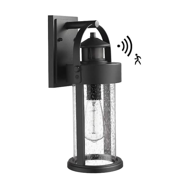 JAZAVA Black Motion Sensing Dusk to Dawn Weather Resistant Outdoor Hardwired Wall Lantern Scone with Seeded Glass Shade