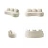 Four different views of the beige curved loveseat.