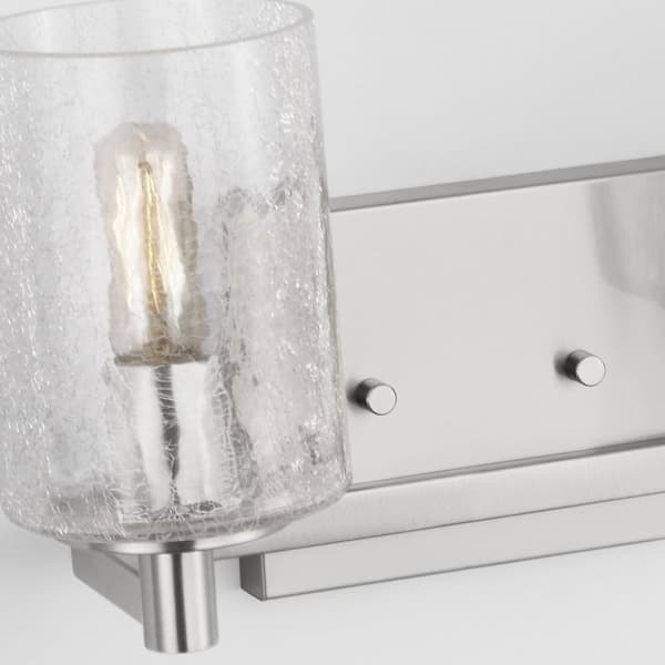 Generation Lighting - Parker 14.25 in. W x 7.75 in. H 2-Light Brushed Steel Bathroom Vanity Light with Clear Crackle Glass Shades