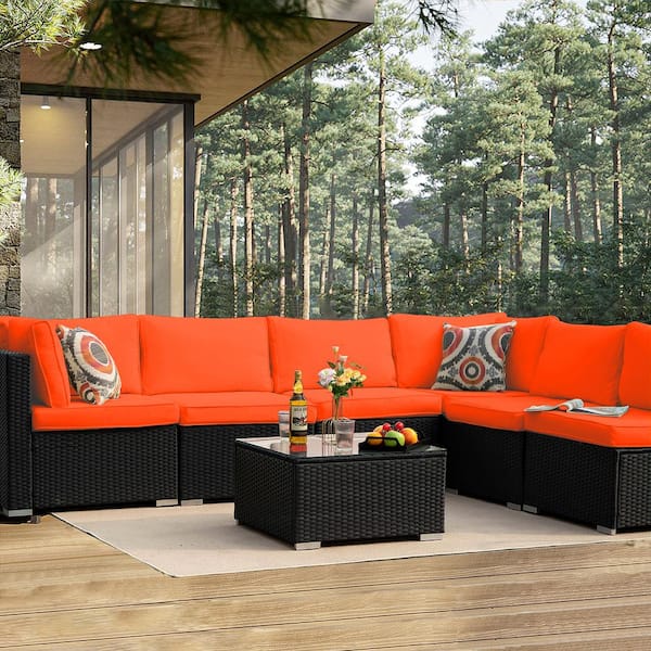 Cesicia 7-Piece Wicker Outdoor Sectional Set with Orange Cushions and Coffee Table