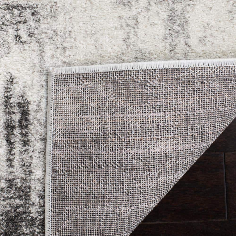 Ivory and Grey Round Synthetic Easy Care Area Rug