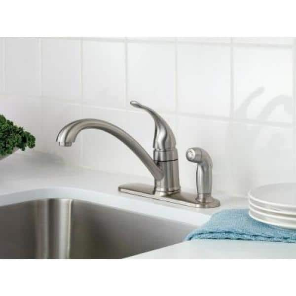 Torrance Single-Handle Low-Arc Standard Kitchen Faucet with Side Sprayer on Deck in Spot Resist Stainless