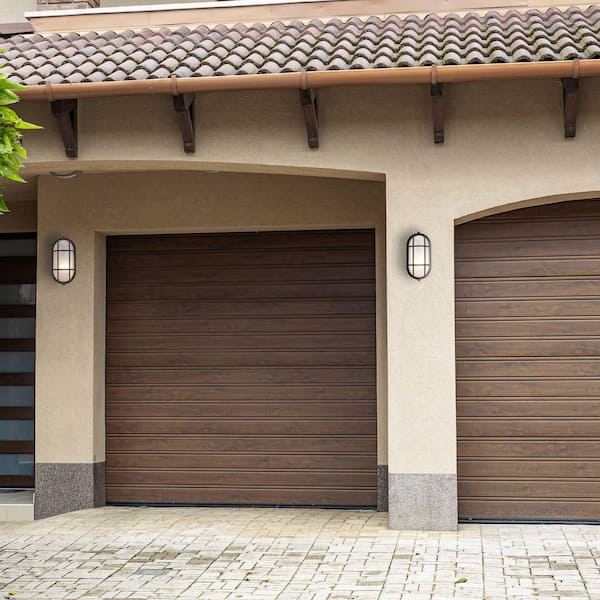 Aria 8.25 in. 1-Light Rust Oval Bulkhead Outdoor Wall Light Fixture with Ribbed Glass