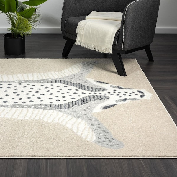 Nuevo Ivory 4 ft. x 6 ft. Animal Polypropylene Area Rug