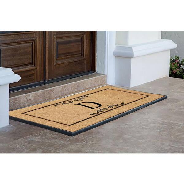 https://images.thdstatic.com/productImages/668f315c-ffa0-4e13-b193-fe26550782bc/svn/black-beige-a1-home-collections-door-mats-a1home200185-d-40_600.jpg