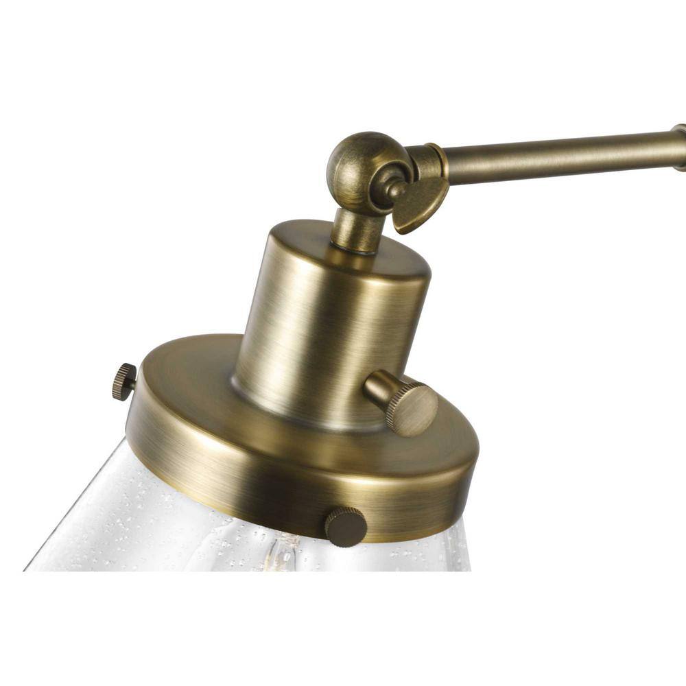 Vintage Brass Swing Arm Wall Sconce with Seeded Glass Shade