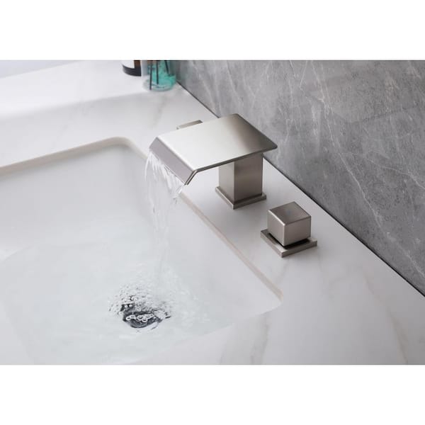 https://images.thdstatic.com/productImages/6697b022-bed1-44fd-a9f4-8843640b2807/svn/brushed-nickel-aurora-decor-widespread-bathroom-faucets-fah2bjk0006-31_600.jpg