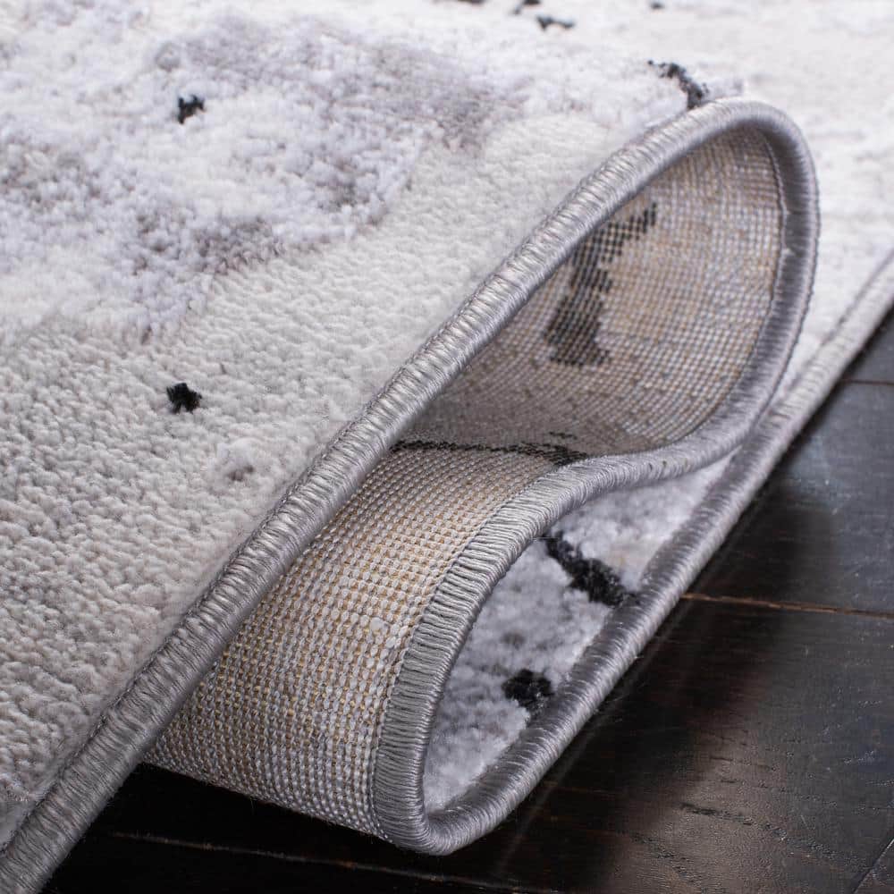 Handmade Round Gray and Black Abstract Synthetic Rug