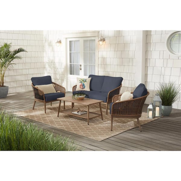 Hampton Bay Coral Vista 4-Piece Brown Wicker and Steel Patio Conversation Seating Set with CushionGuard Sky Blue Cushions