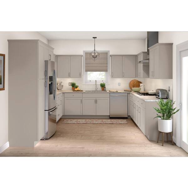 https://images.thdstatic.com/productImages/66b19be5-1c31-4c0a-908d-e56e22396af7/svn/gray-hampton-bay-assembled-kitchen-cabinets-f12scb36r-31_600.jpg