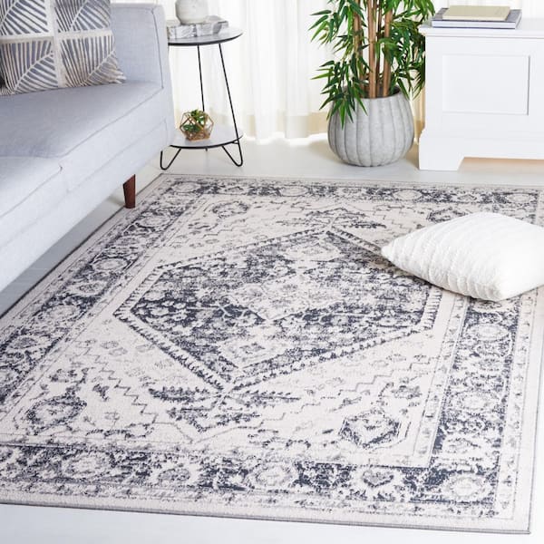 Odyssey 9 ft. x 12 ft. Ivory/Gray Distressed Border Area Rug