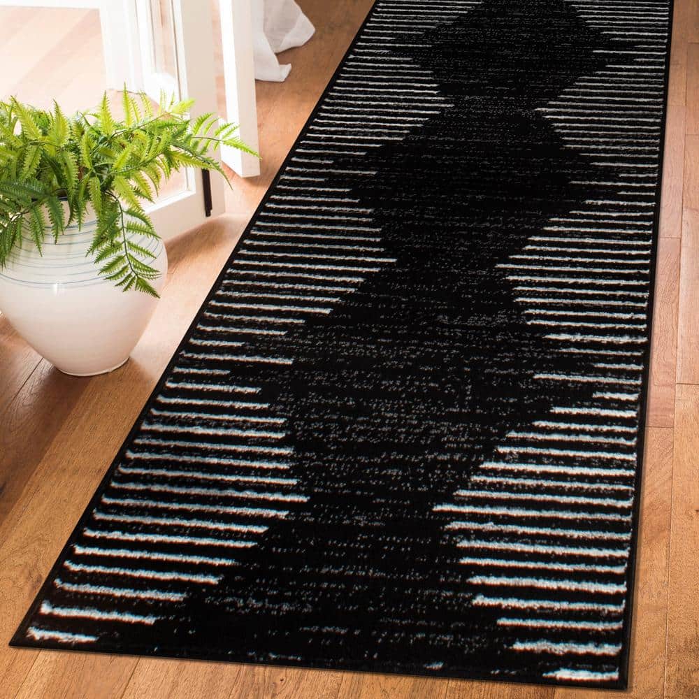 Bohemian Black and White Stripe Synthetic Runner Rug 2' x 7'