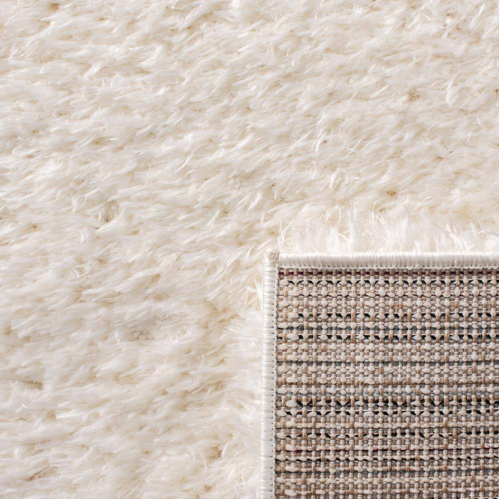 Ivory Solid Shag 8' x 10' Wool and Synthetic Area Rug