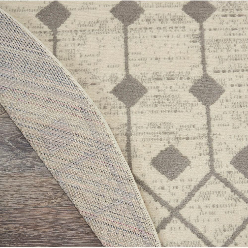 Ivory and Grey Geometric Round Synthetic Area Rug, 63"