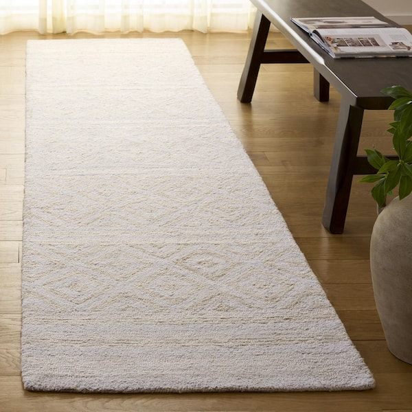 Capri 2 ft. x 9 ft. Ivory/Beige Tribal Runner Rug