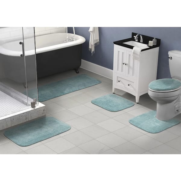 https://images.thdstatic.com/productImages/6731ff50-b092-4bf8-886f-8dbe4b5d2cff/svn/sea-foam-garland-rug-bathroom-rugs-bath-mats-ba010w5p06i6-31_600.jpg