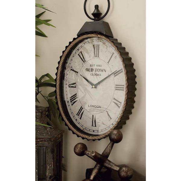 Litton Lane 12 in. x 21 in. Black Metal Pocket Watch Style Wall Clock with Rope Accent
