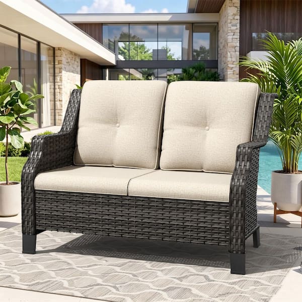 Brown Wicker Outdoor Patio Loveseat with Beige Cushions