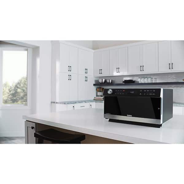 https://images.thdstatic.com/productImages/67546432-a4bc-4a12-952e-b4439ac91497/svn/stainless-steel-and-black-combination-galanz-countertop-microwaves-gtwhg12s1sa10-1d_600.jpg