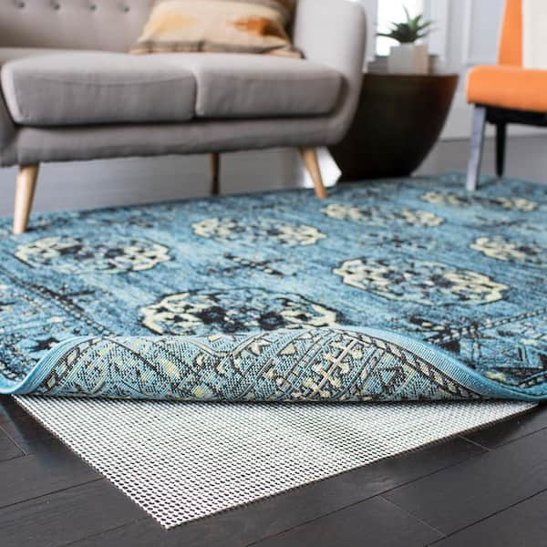 SAFAVIEH Durable Hard Surface and Carpet Non Slip Rug Pad - Grey