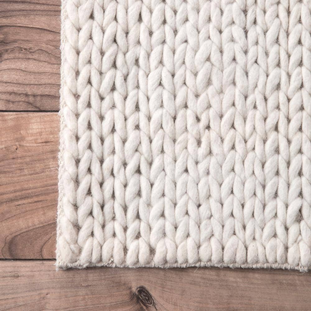 Handmade Off-White Braided Wool 4' x 6' Area Rug