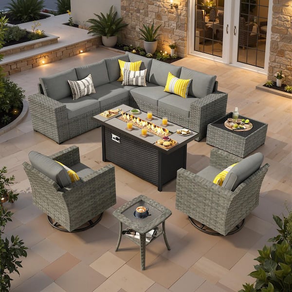 Lullaby 10-Pieces Wicker Outdoor Patio 54in. Rectangular Fire Pit Set and Swivel Rocking Chairs with Dark Gray Cushions