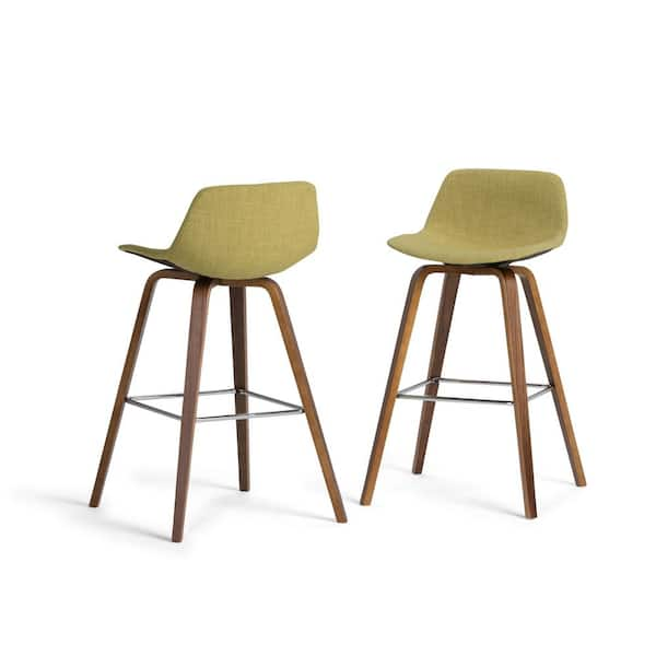 https://images.thdstatic.com/productImages/676215a2-0e47-4e1b-ac8d-fd3d5928e82a/svn/acid-green-natural-simpli-home-bar-stools-axcran30n-g-4f_600.jpg