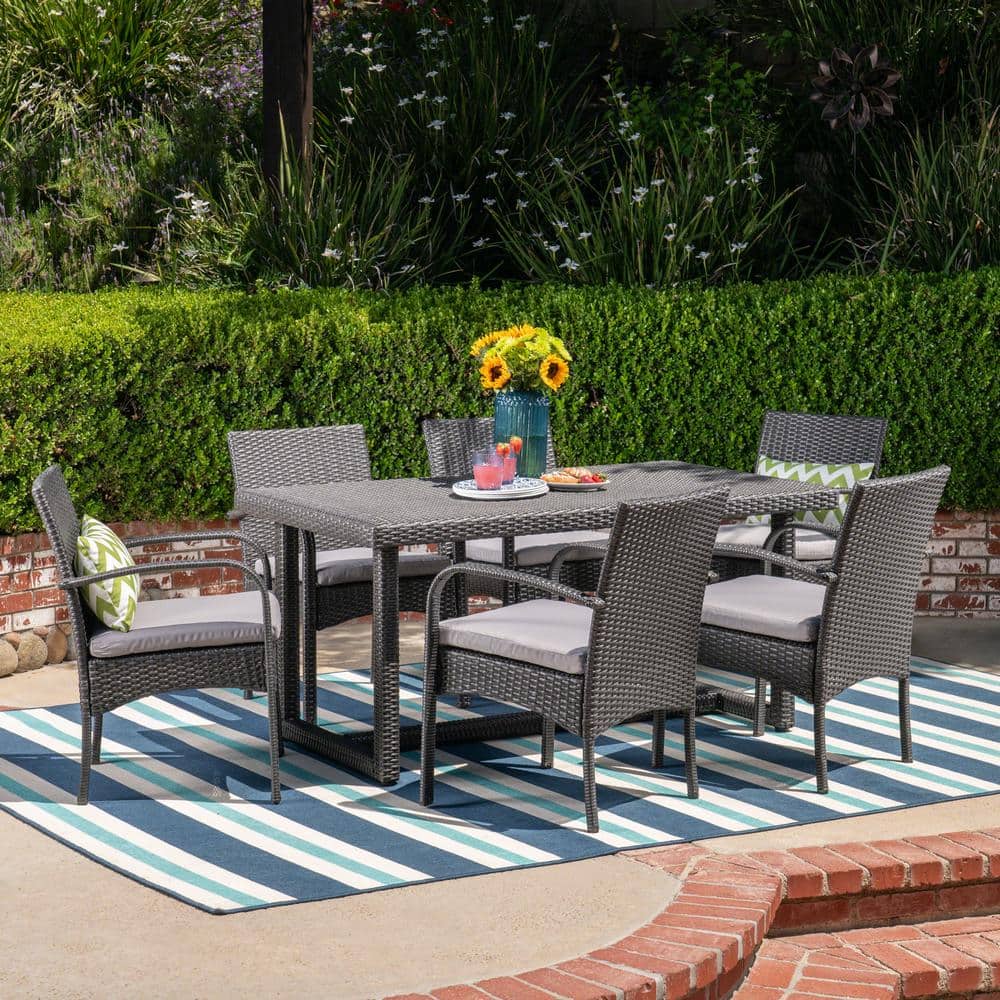 Harlowe Grey 7-Piece Faux Rattan Rectangle 28 in. Outdoor Dining Set with Grey Cushions