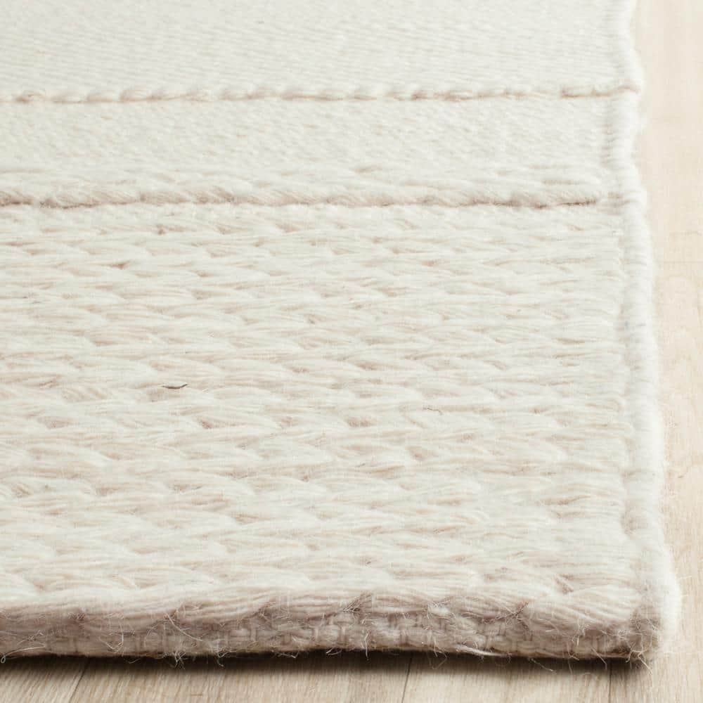 Ivory Hand-Tufted Wool Rectangular 9' x 12' Rug