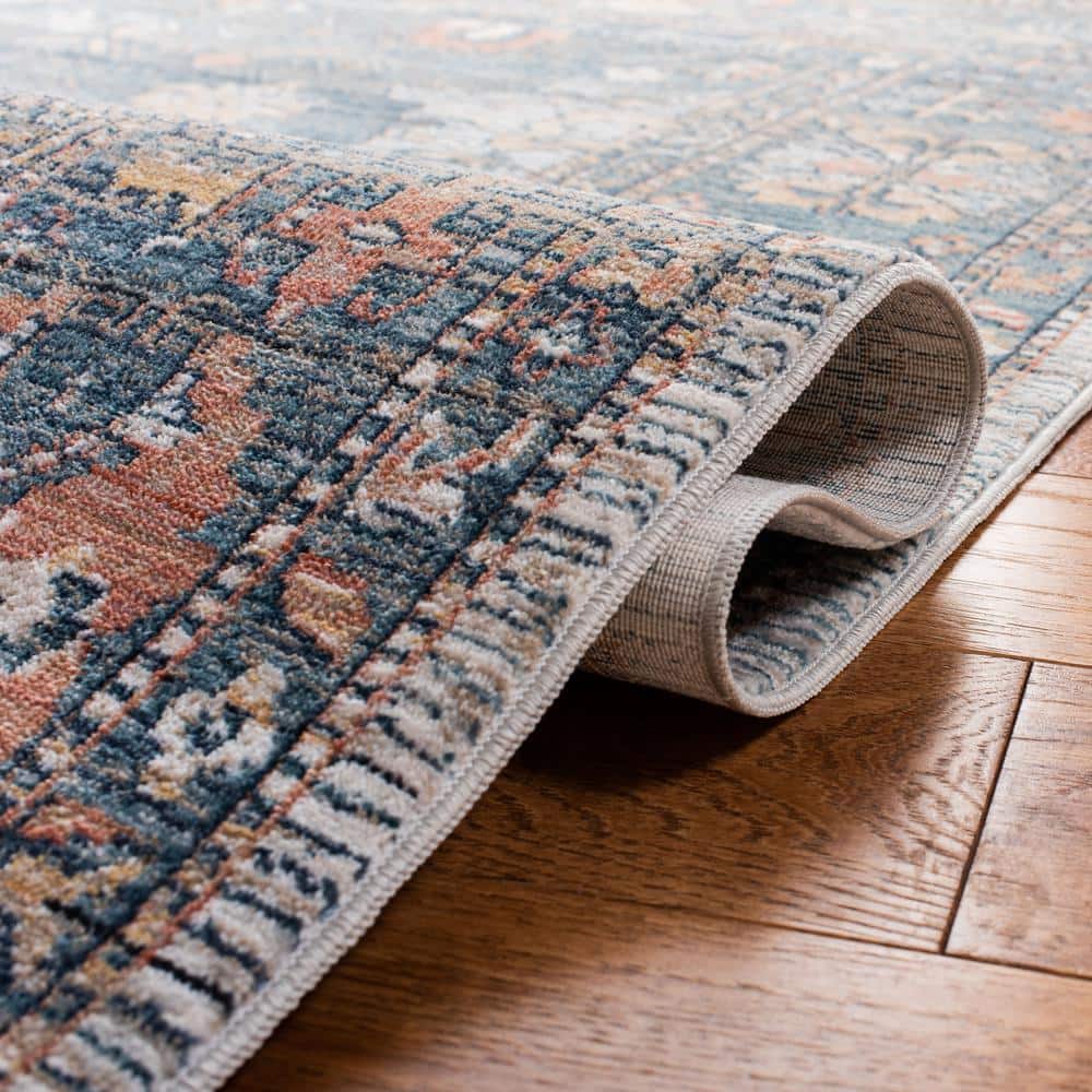 Elegant Blue & Ivory Synthetic 9' x 12' Easy-Care Area Rug