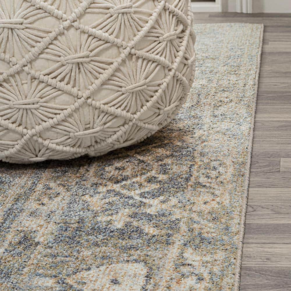 Pavel Distressed Blue and Cream Synthetic Medallion Washable Area Rug 5'3" x 7'7"