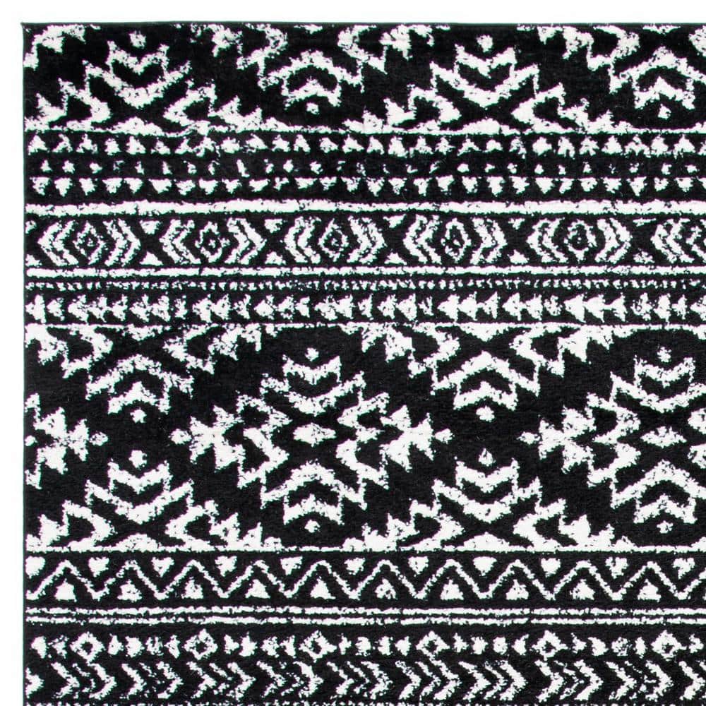 Bohemian Bliss Geometric Black & Ivory Synthetic Area Rug - 8' x 10'