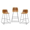 Three bar stools in whiskey brown and black metal frames, product shot.