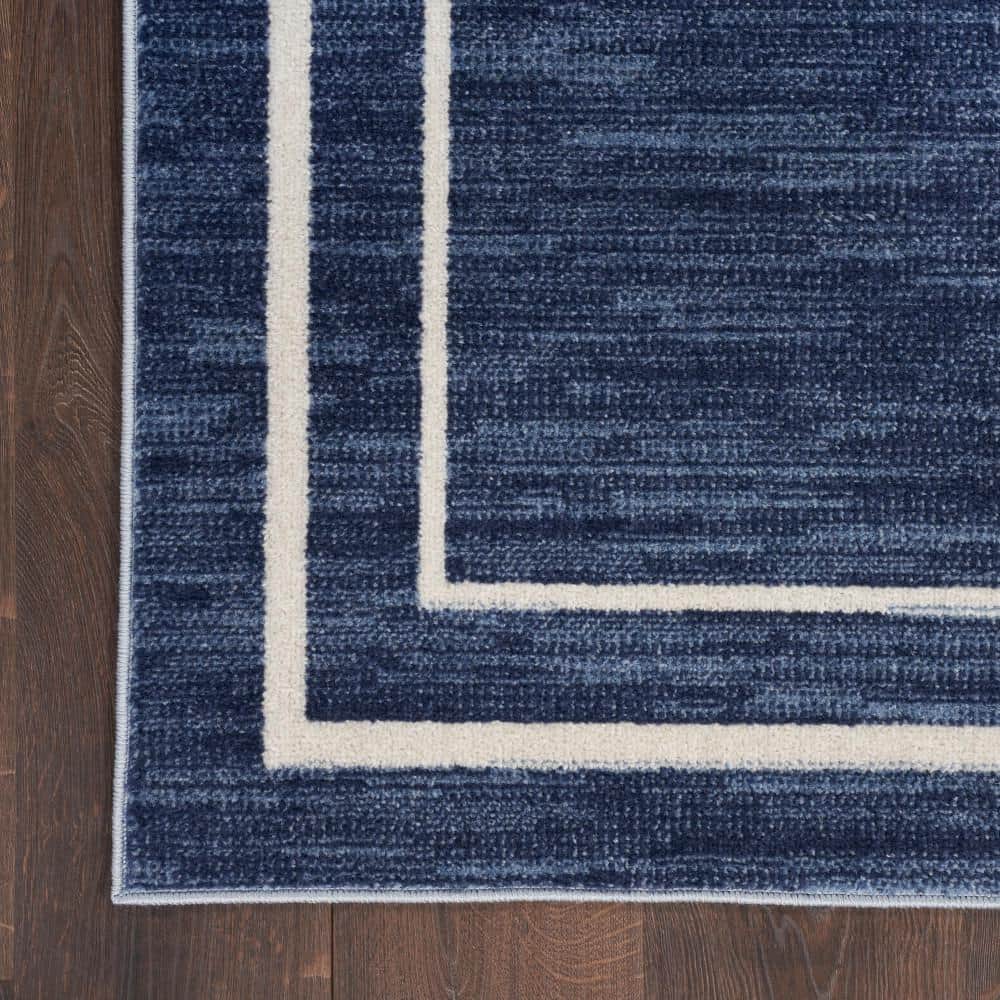Navy and Ivory 10' x 14' Synthetic Rectangular Rug