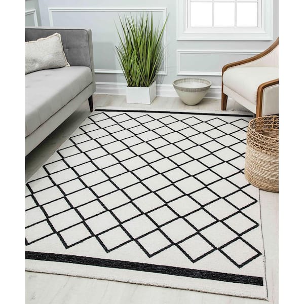 https://images.thdstatic.com/productImages/67b16ee2-b4ba-493a-ae8f-ca09e51d4aad/svn/imperial-onyx-ivory-rugs-america-area-rugs-ra30310-c3_600.jpg