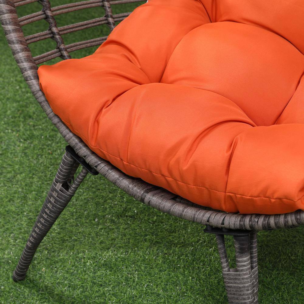 Gray Wicker Teardrop Chair with Orange Cushions