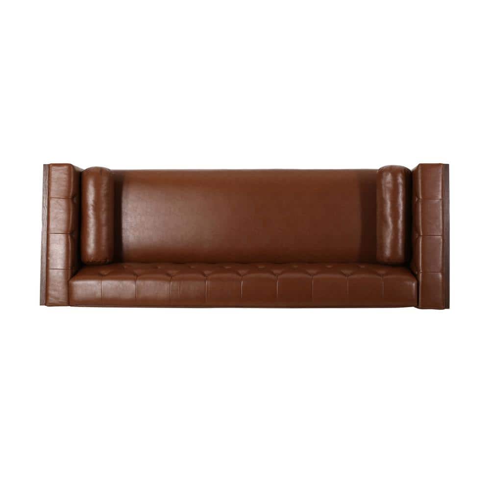 Front view of a cognac brown faux leather tuxedo sofa.