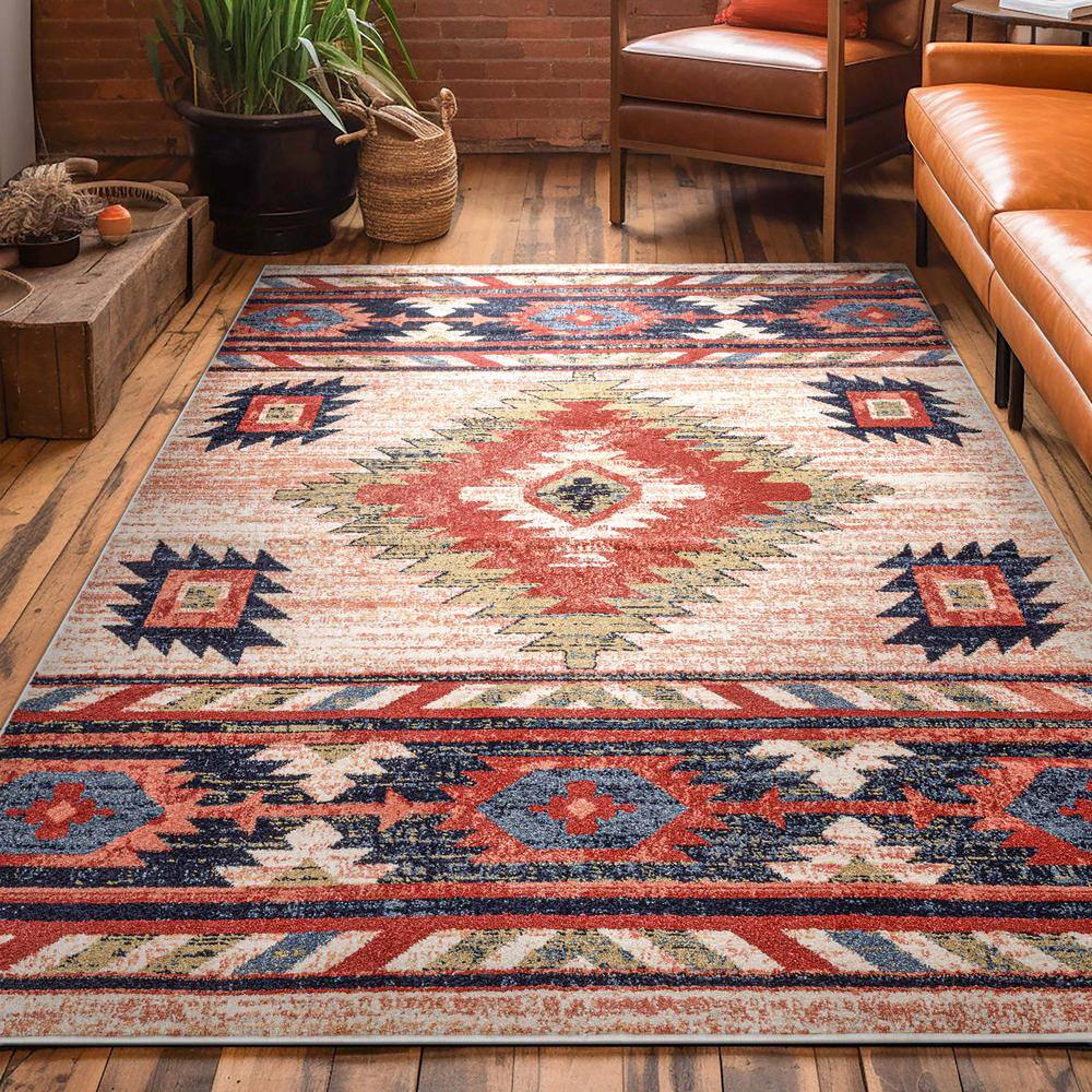 Cream and Multicolor 4' x 6' Southwestern Synthetic Area Rug