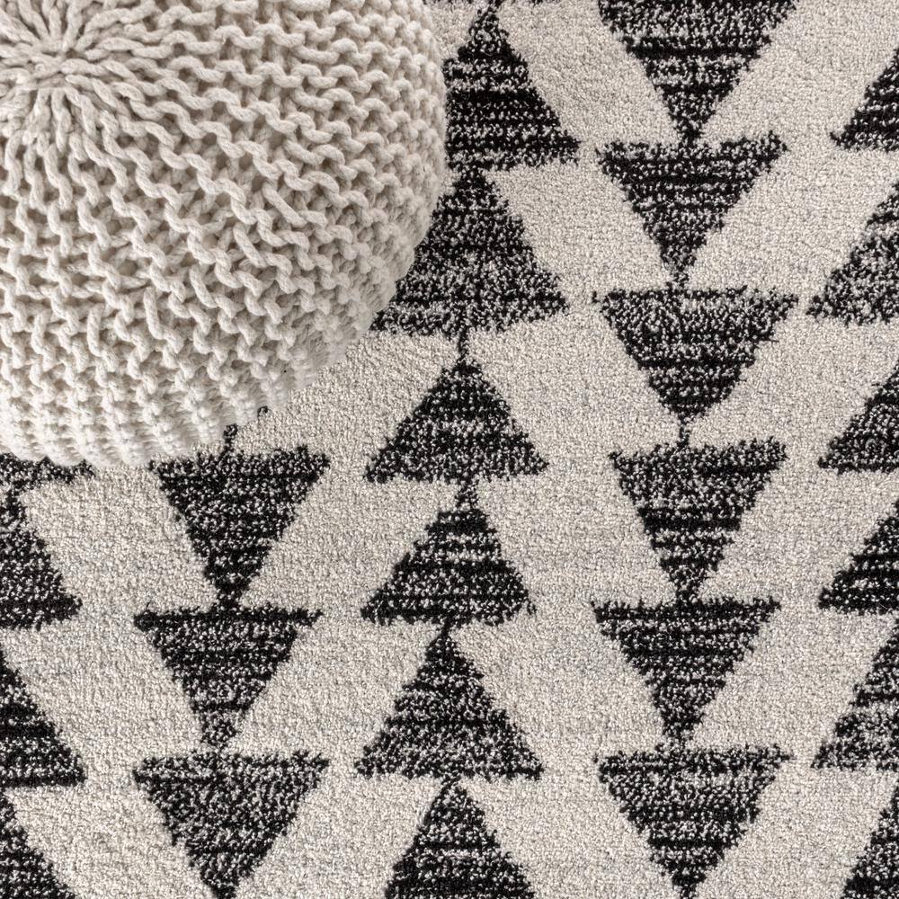 Aisha Cream and Black Geometric Synthetic Area Rug