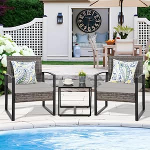 3-Piece Wicker Outdoor Bistro Set, Glass Top Side Table and PE Wicker Chairs with Gray Cushion, Black Metal Frame