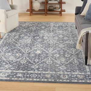 Astra Machine Washable Dark Blue 7 ft. x 9 ft. Distressed Traditional Area Rug