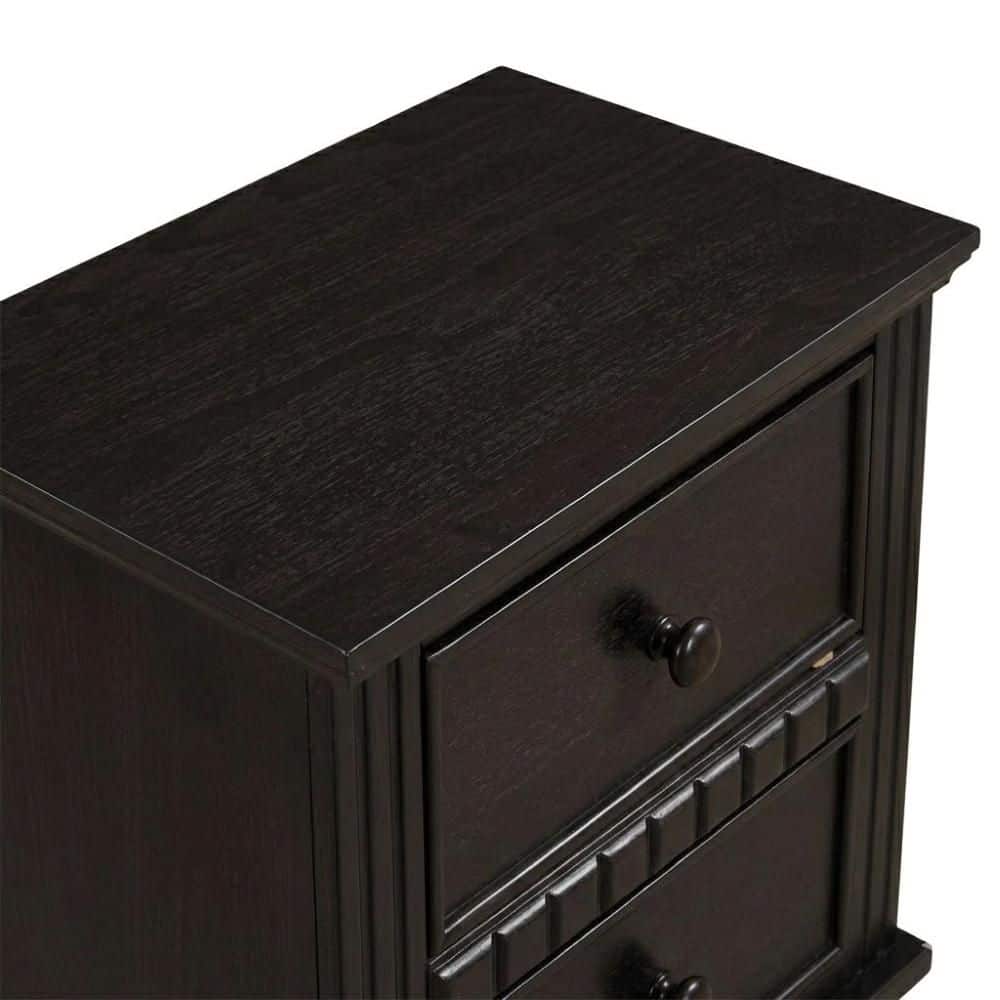 Close-up view of the nightstand top and top drawer