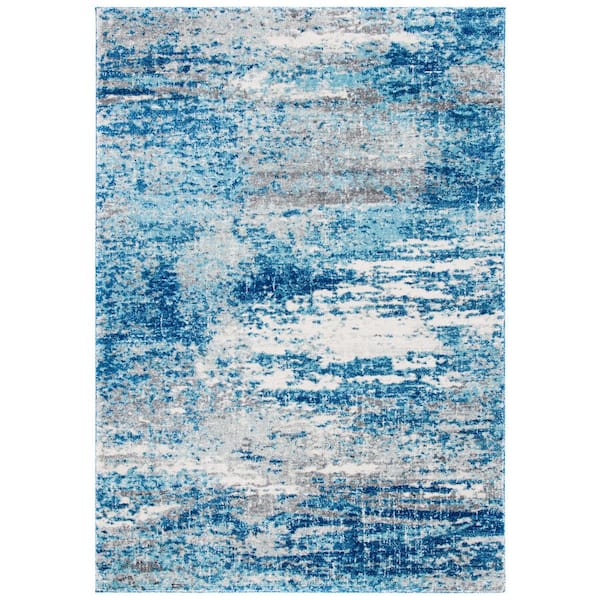 SAFAVIEH Evoke Light Blue/Gray 9 ft. x 12 ft. Solid Area Rug