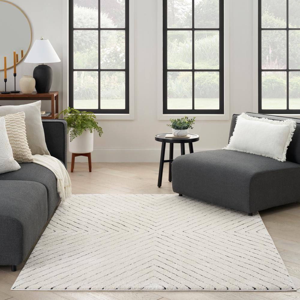 Ivory and Black Chevron Striped 5' x 7' Synthetic Area Rug